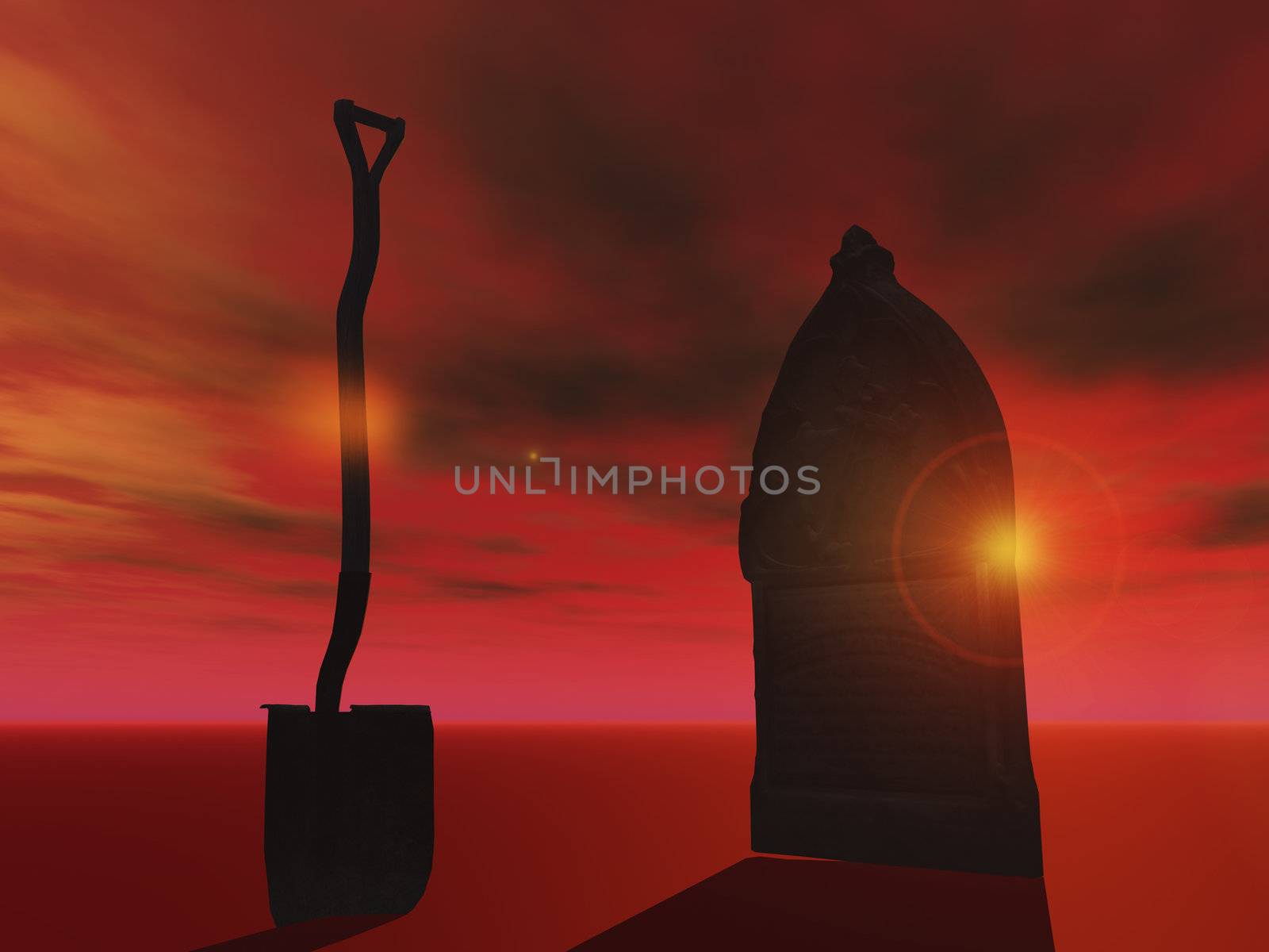 spade and gravestone with sunset