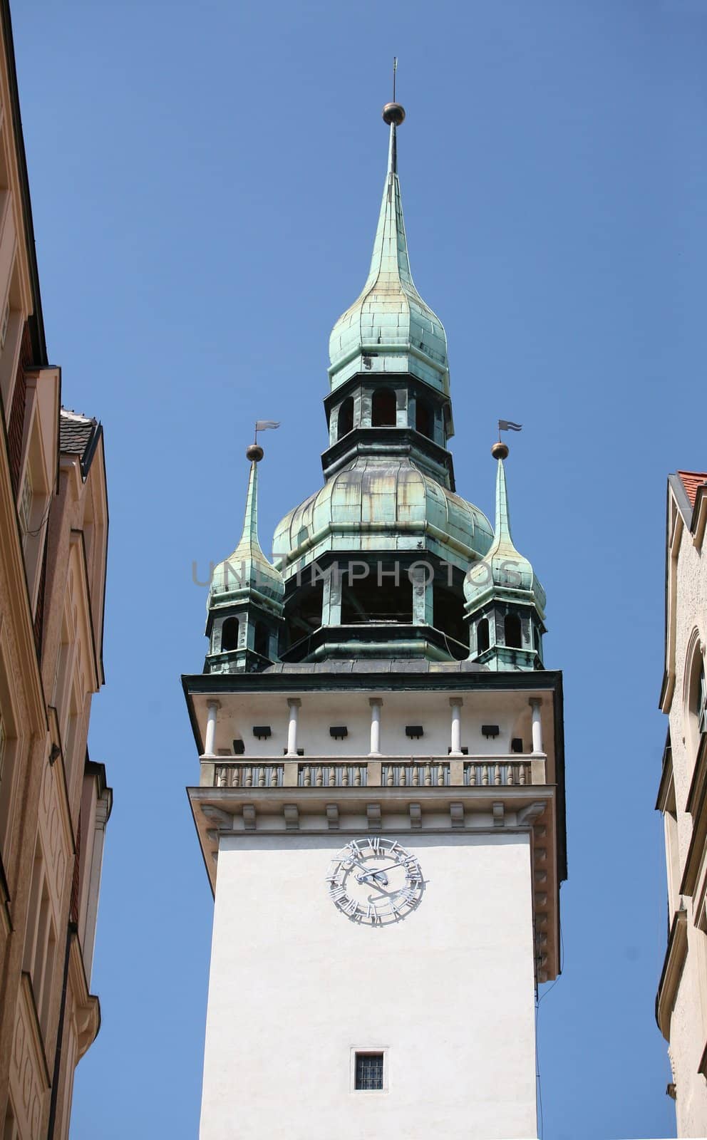 Clock tower of bohemian church in perspective