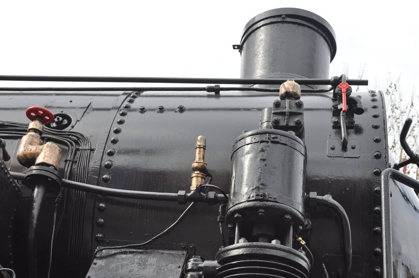 Detail of ancient steam train locomotive vehicle