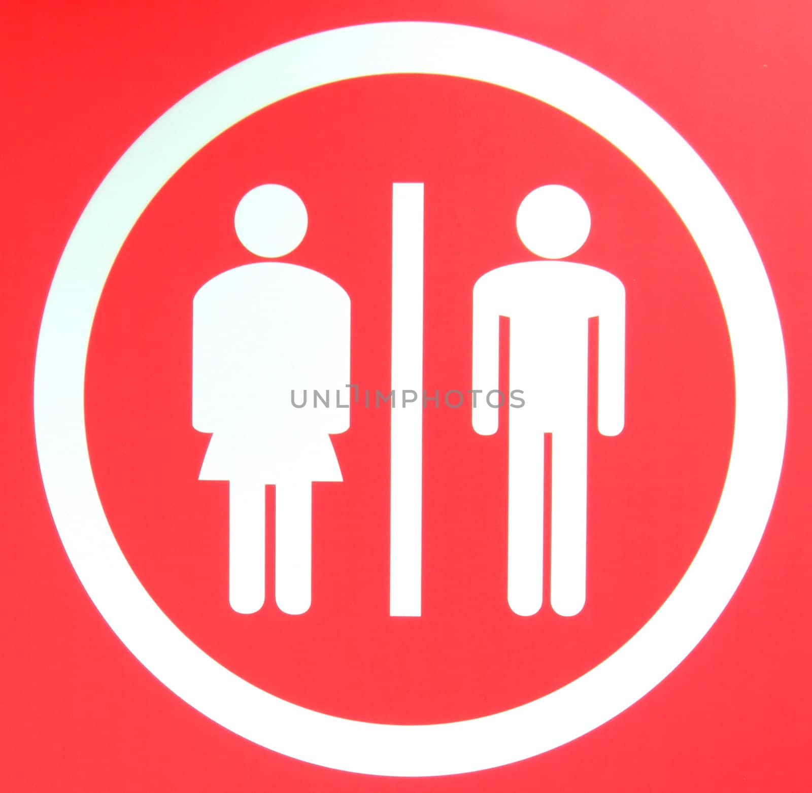 A toilet sign for ladies and gents