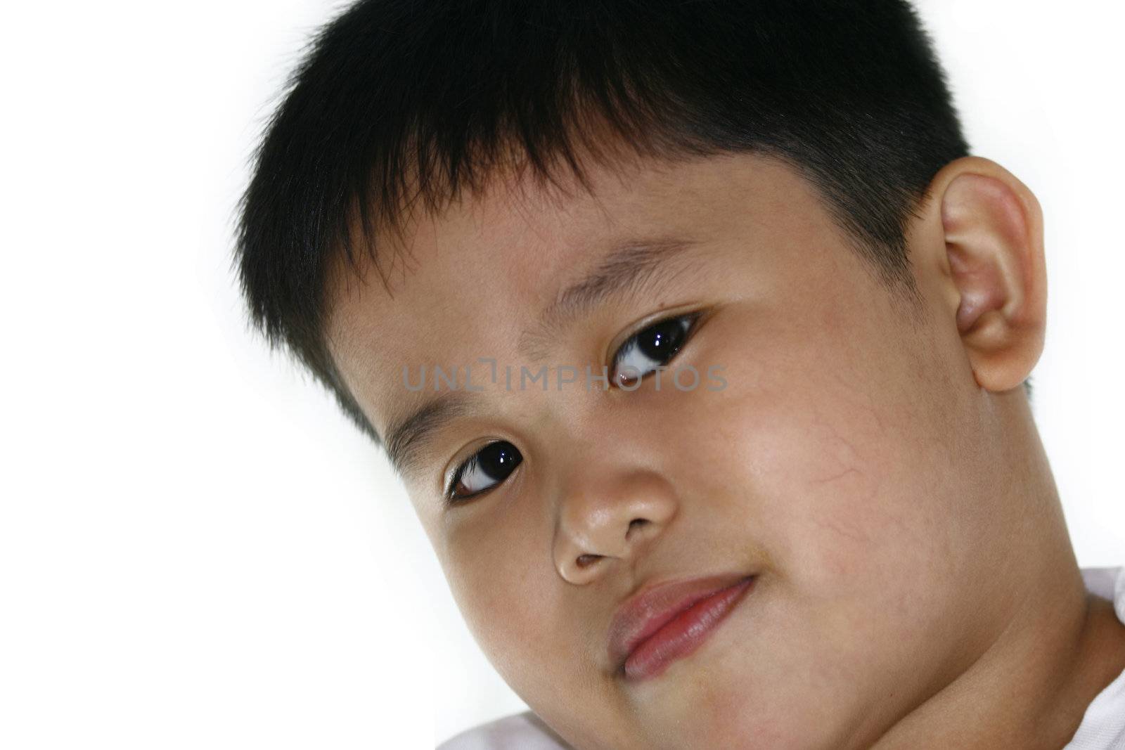 close-up portrait of an asian boy in white background