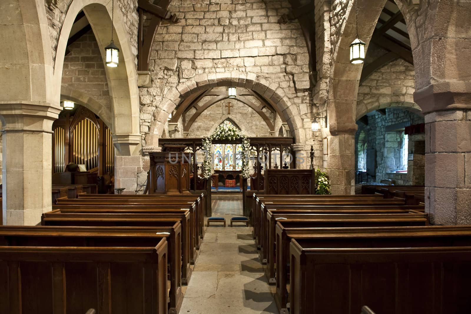 church interior showing centre isle and pews