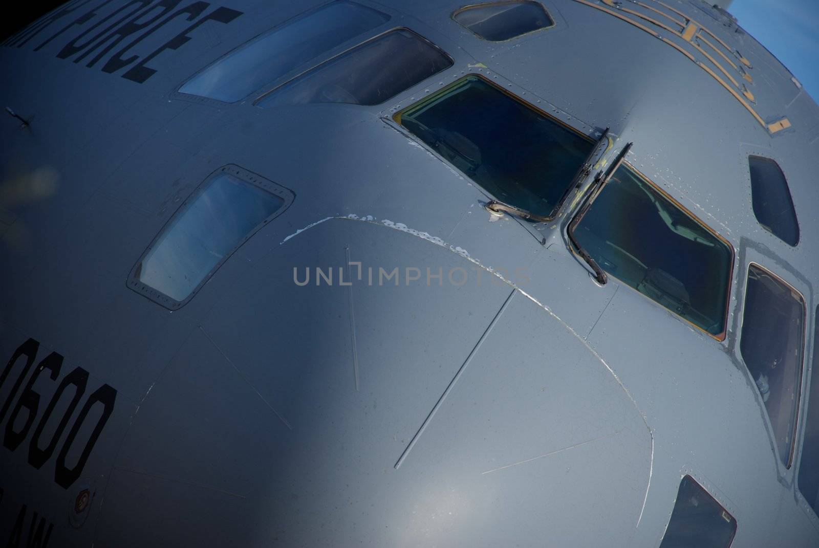 A close-up showing the nose of an Air Force cargo jet