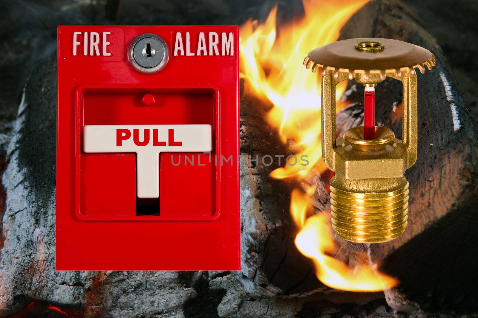 fire alarm pull station and sprinkler valve over a flame background