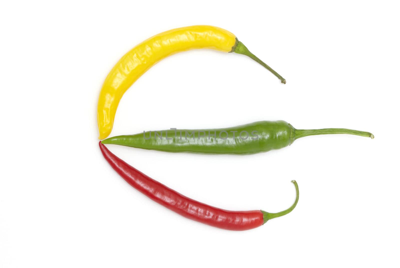 Color chili peppers on white background