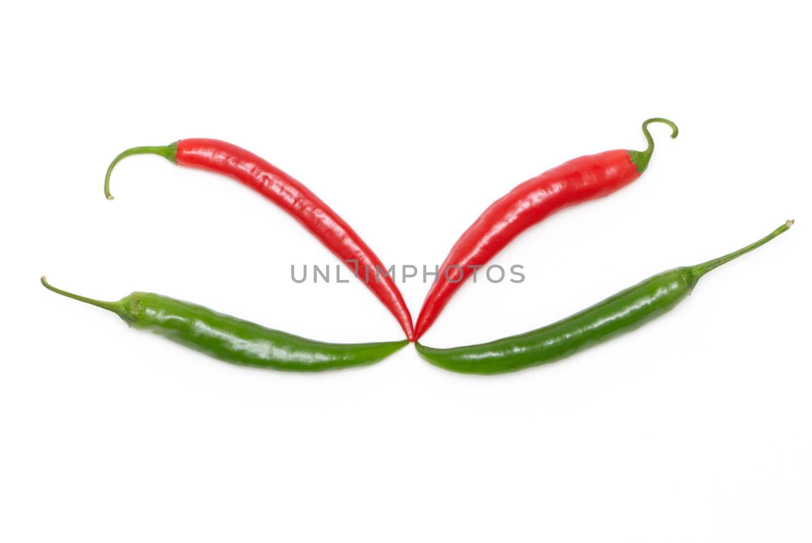 Red and green chili peppers by Olinkau