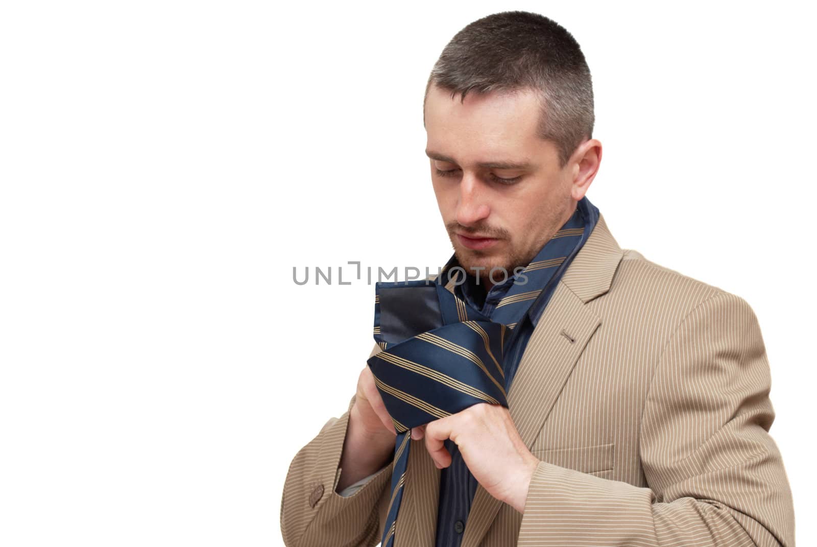 The man fastening a tie by Olinkau