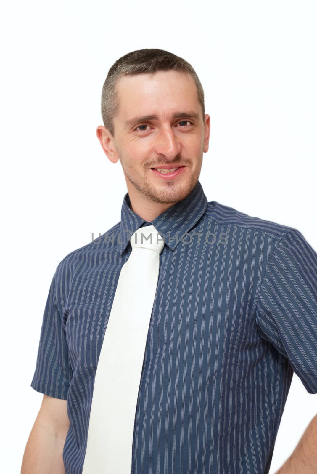 Smiling young businessman on a white background