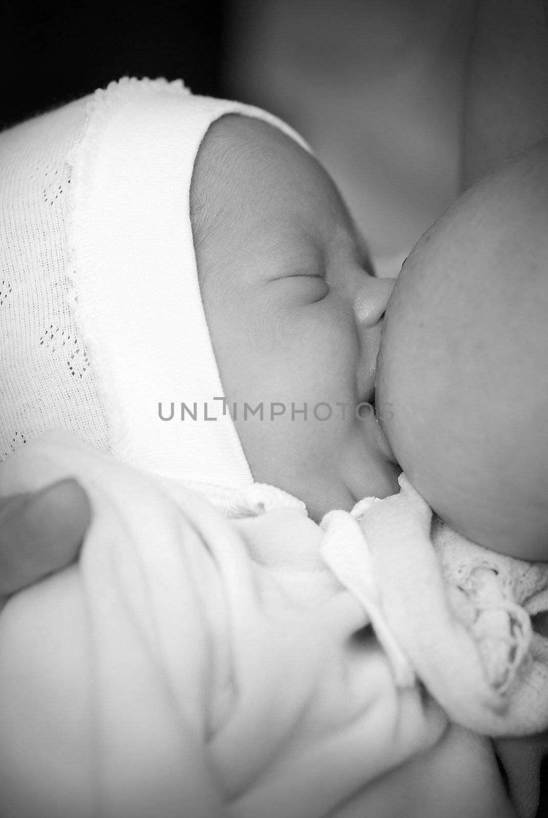 Baby breastfeeding by Olinkau