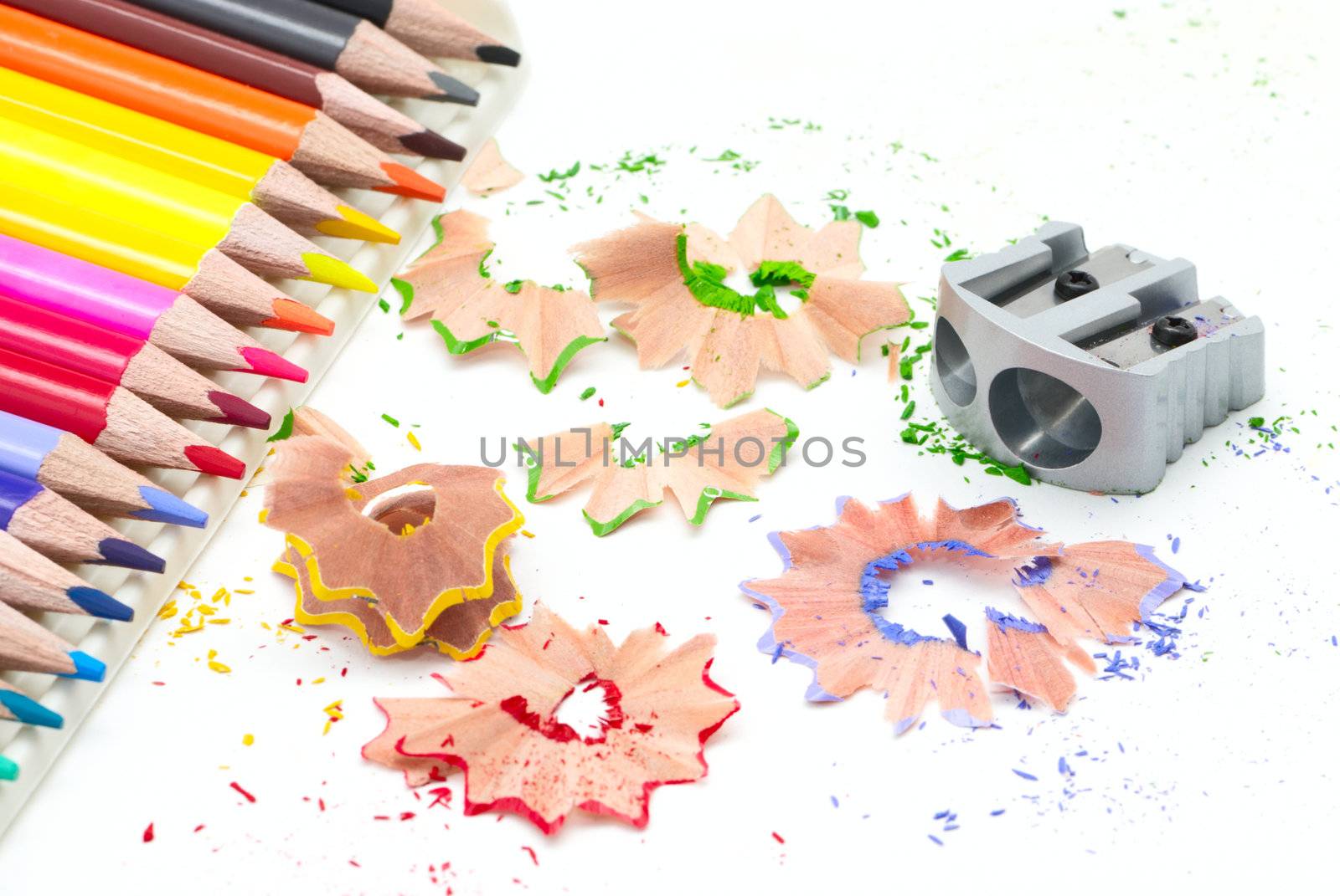 Sharpener with colored pencils and shavings