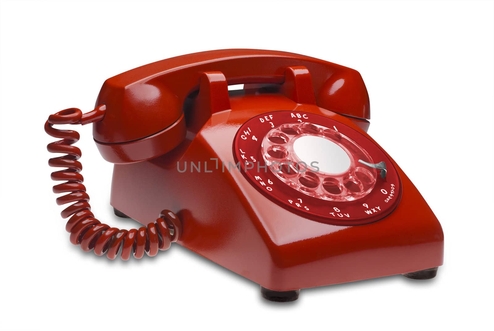 Red angled 60s rotary dial phone isolated with clipping path