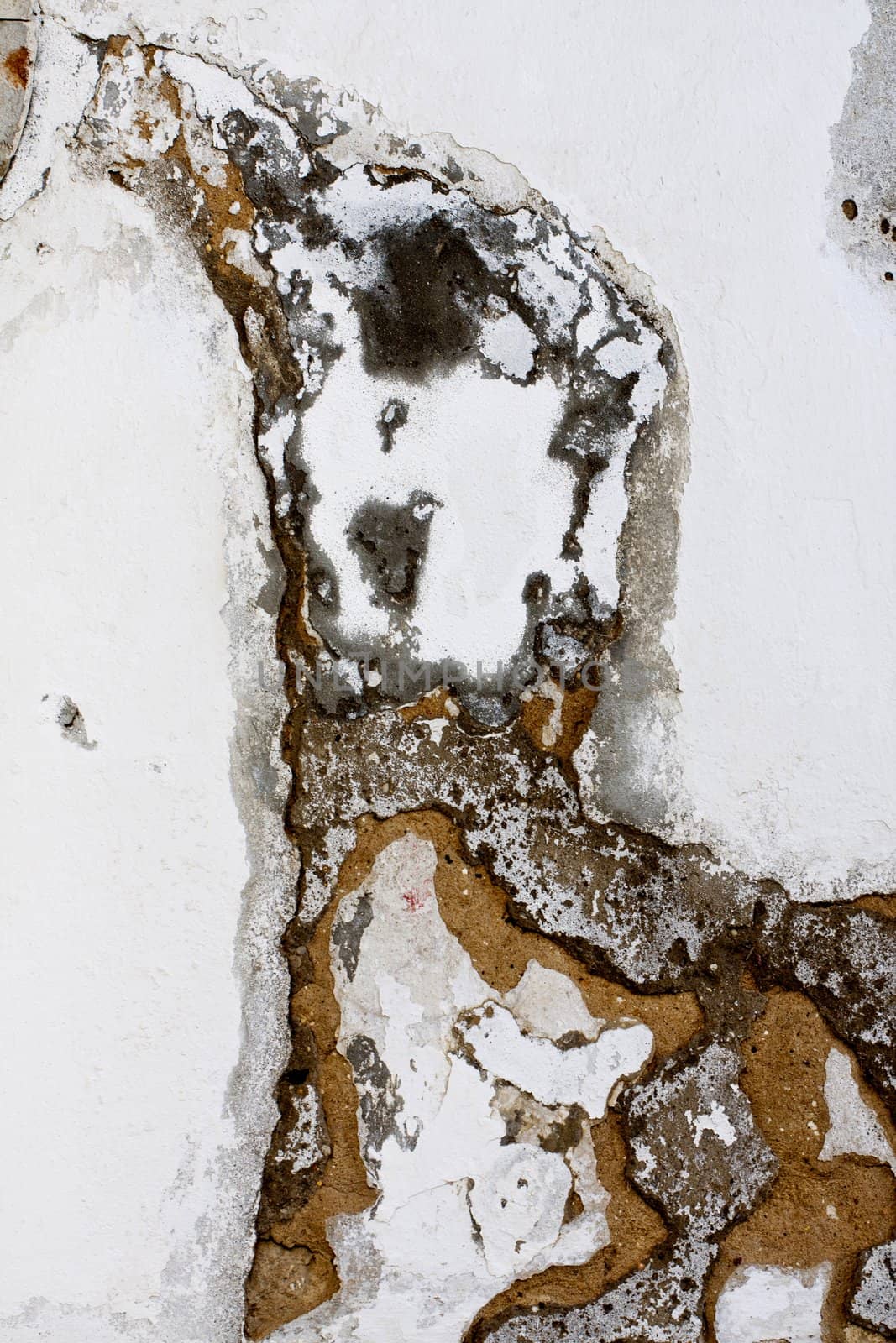 Close up view of a weathered wall texture.