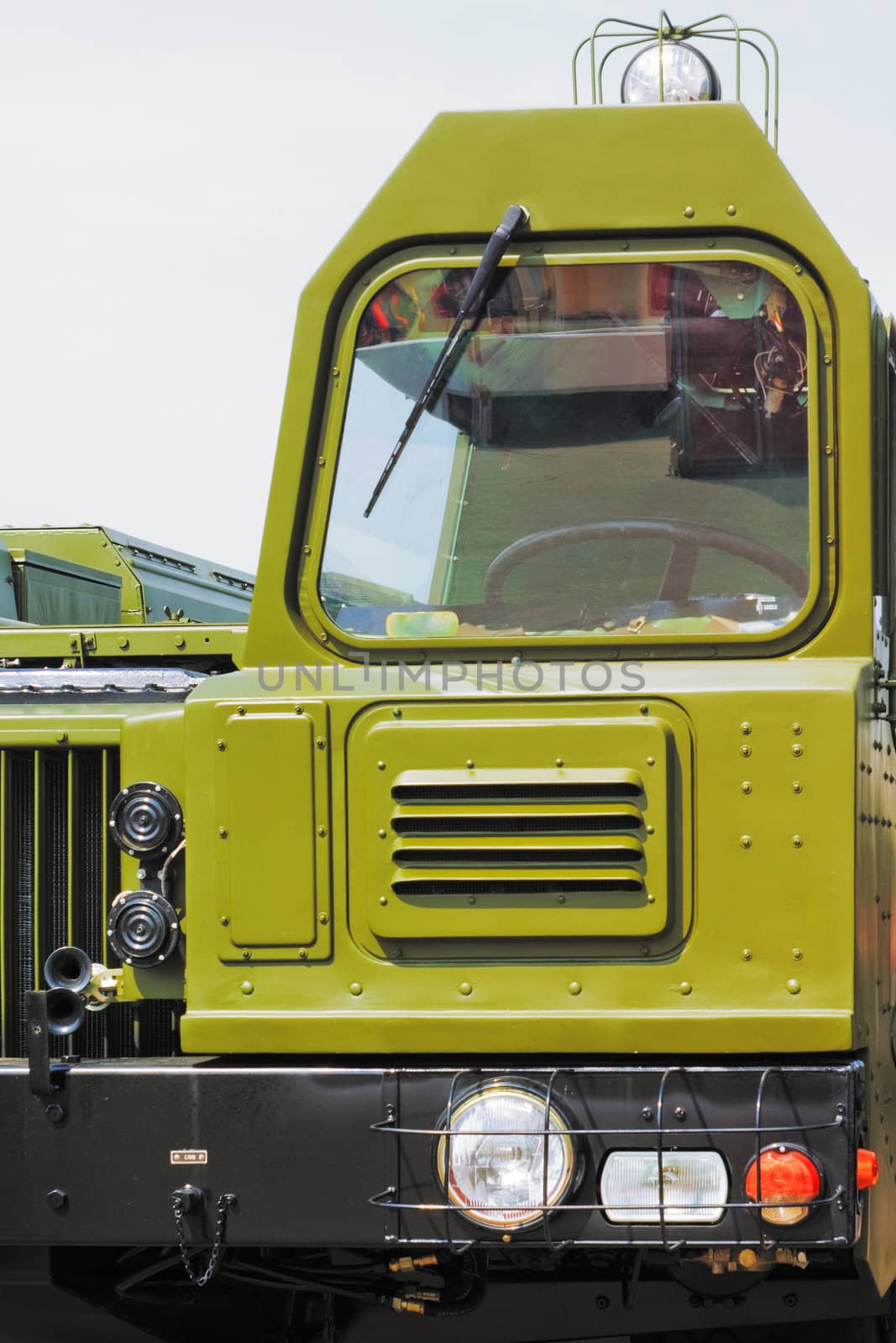 Single green cabin of the rocket military truck