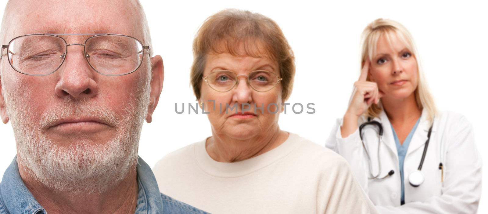 Concerned Senior Couple and Female Doctor Behind by Feverpitched