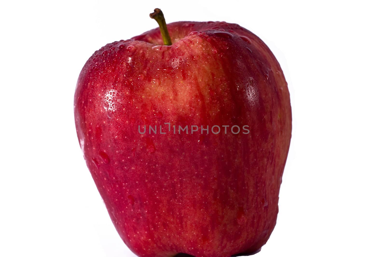 Red ripe apple on a white background for texture