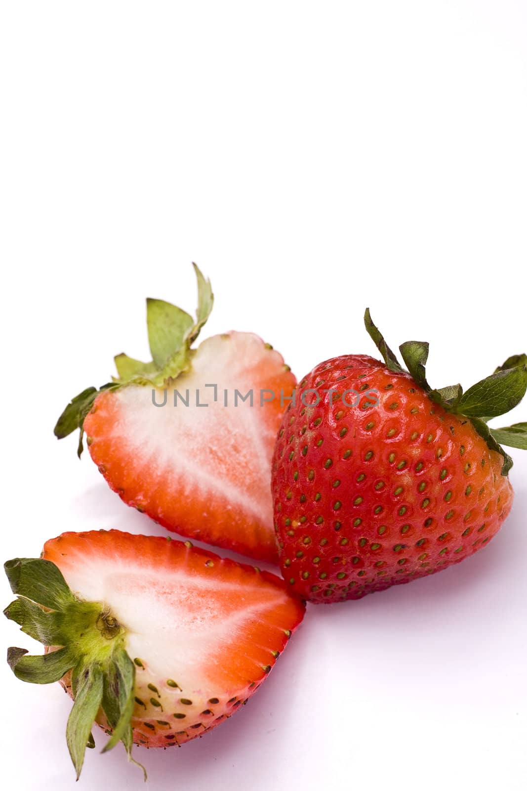 Beautiful strawberries isolated on white for texture