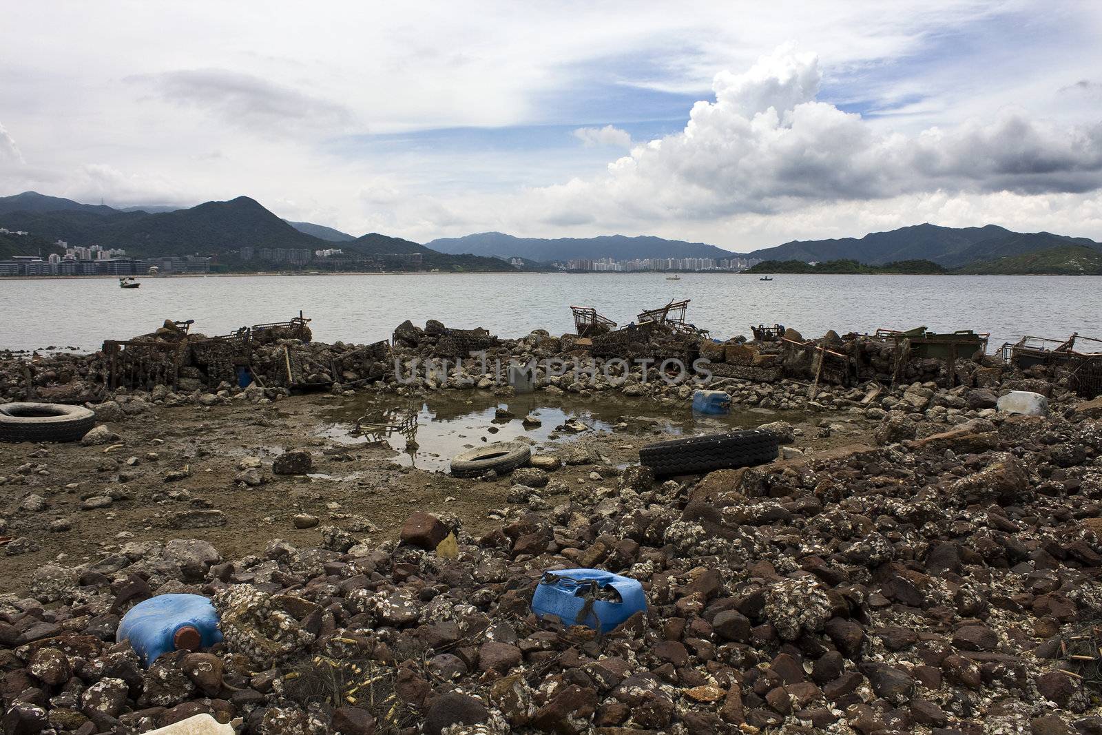 Garbage piled up on the coast of the ocean