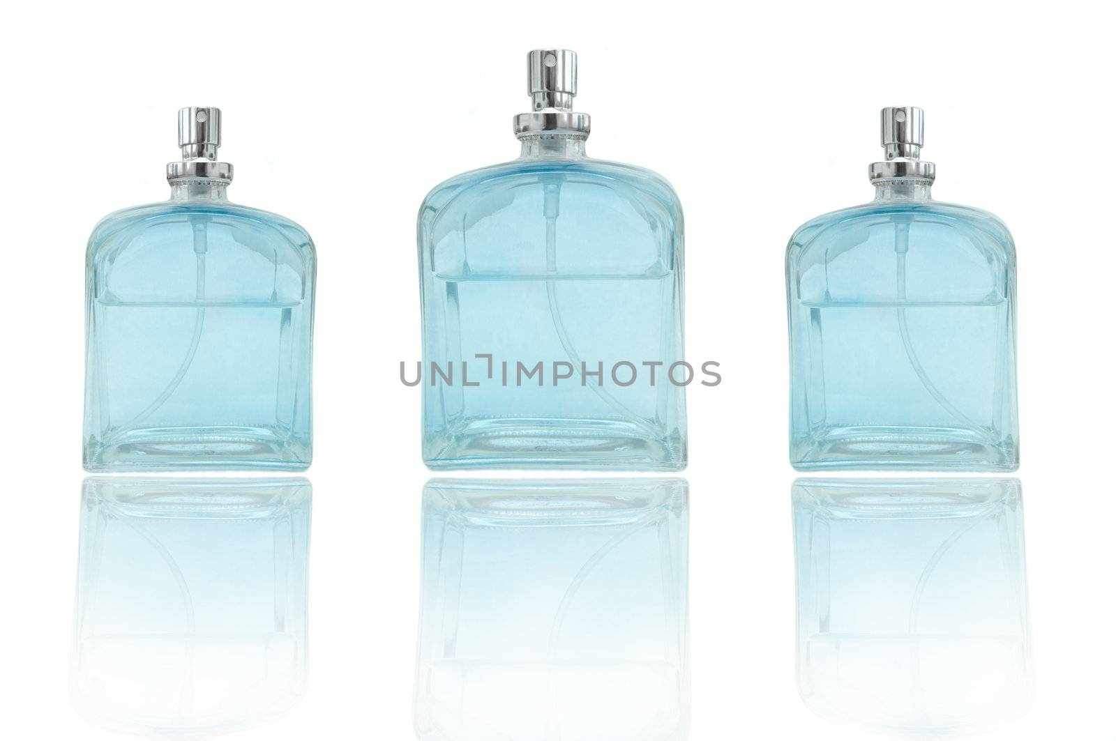 A single glass blue perfume bottle isolated over white