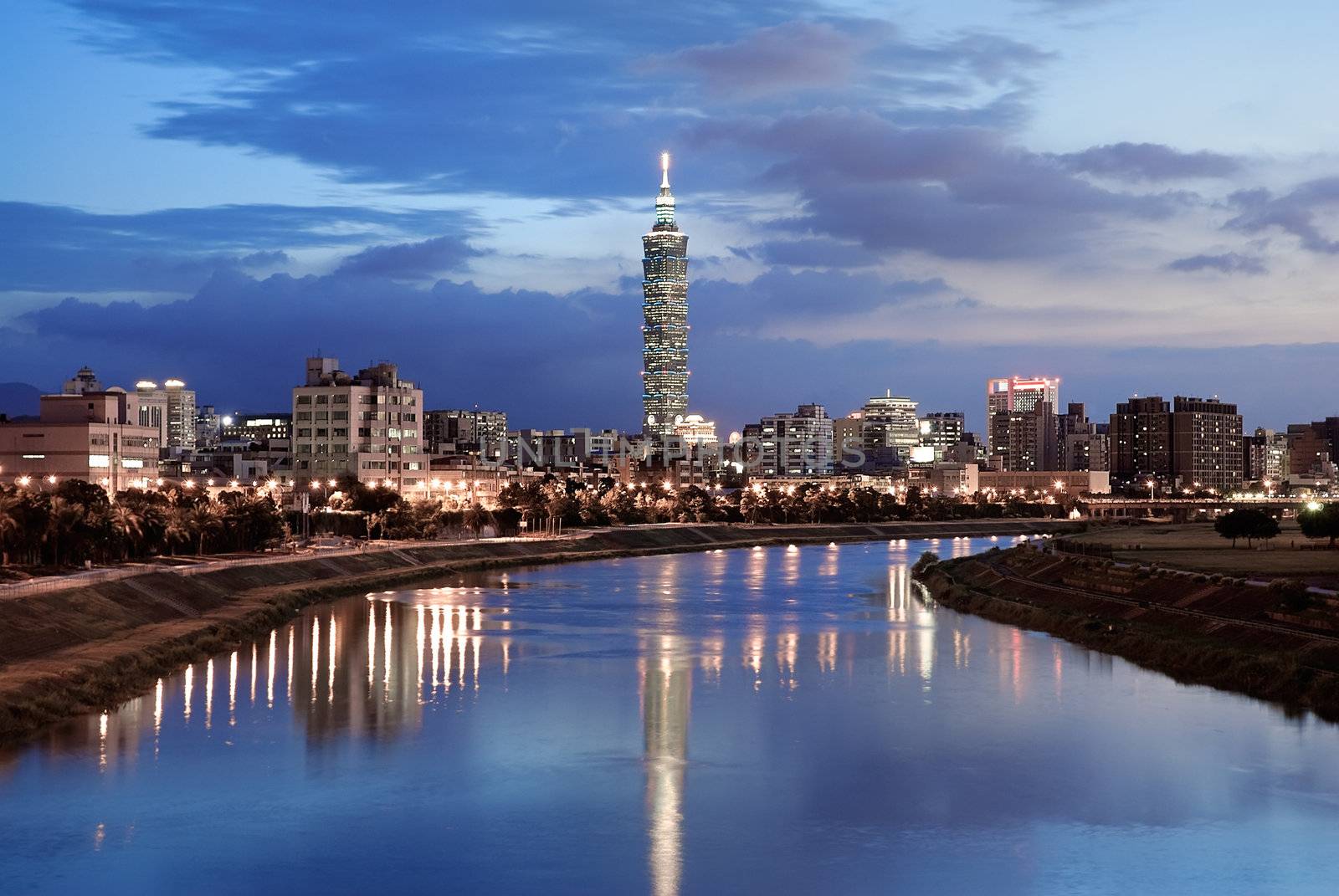 Serenity cityscape with skyscraper and river in night in Taipei, Taiwan.