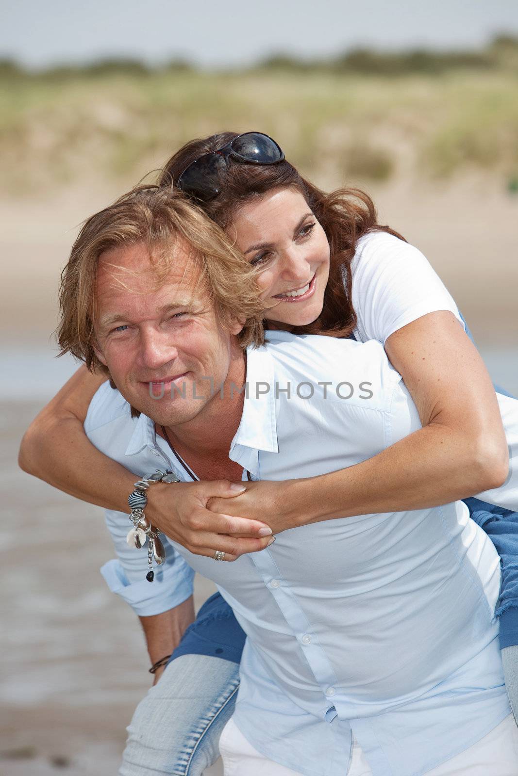 Attractive couple in love on a summer day