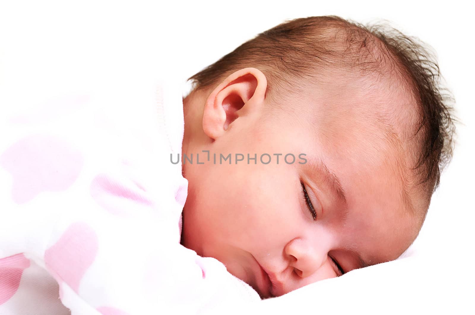 sweet newborn baby girl peaceful and asleep