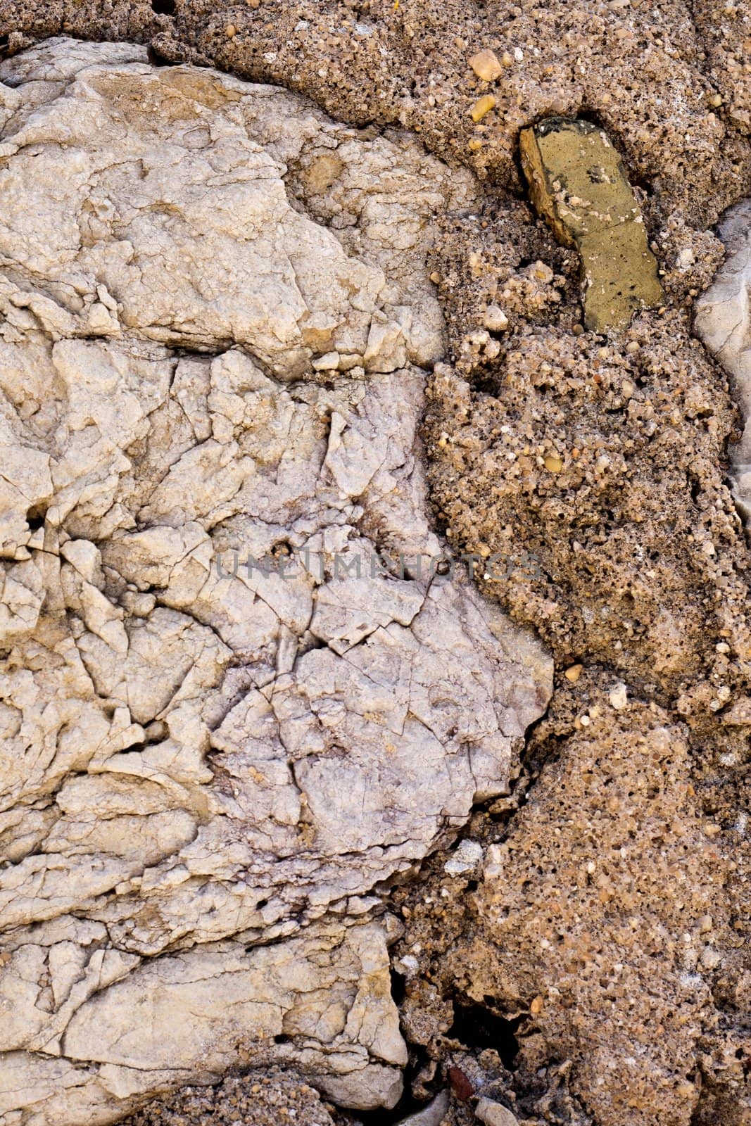 worn textured stone wall by membio