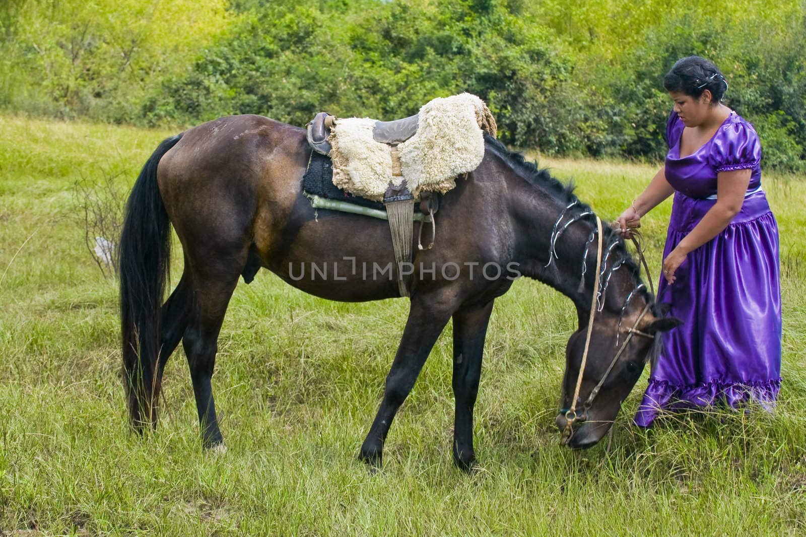 TACUAREMBO, URUGUAY - MAR 6 : Participant in the annual festival "Patria Gaucha" March 6, 2010 in Tacuarembo, Uruguay. It is one of the biggest festival in South America to celebrate gaucho culture