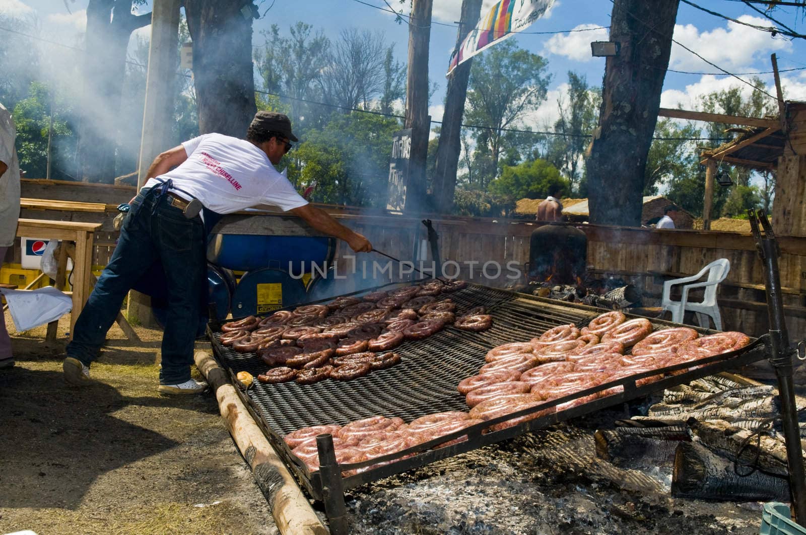 TACUAREMBO, URUGUAY - MAR 6 : barbecue in the annual festival "Patria Gaucha" March 6, 2010 in Tacuarembo, Uruguay. It is one of the biggest festival in South America to celebrate gaucho culture