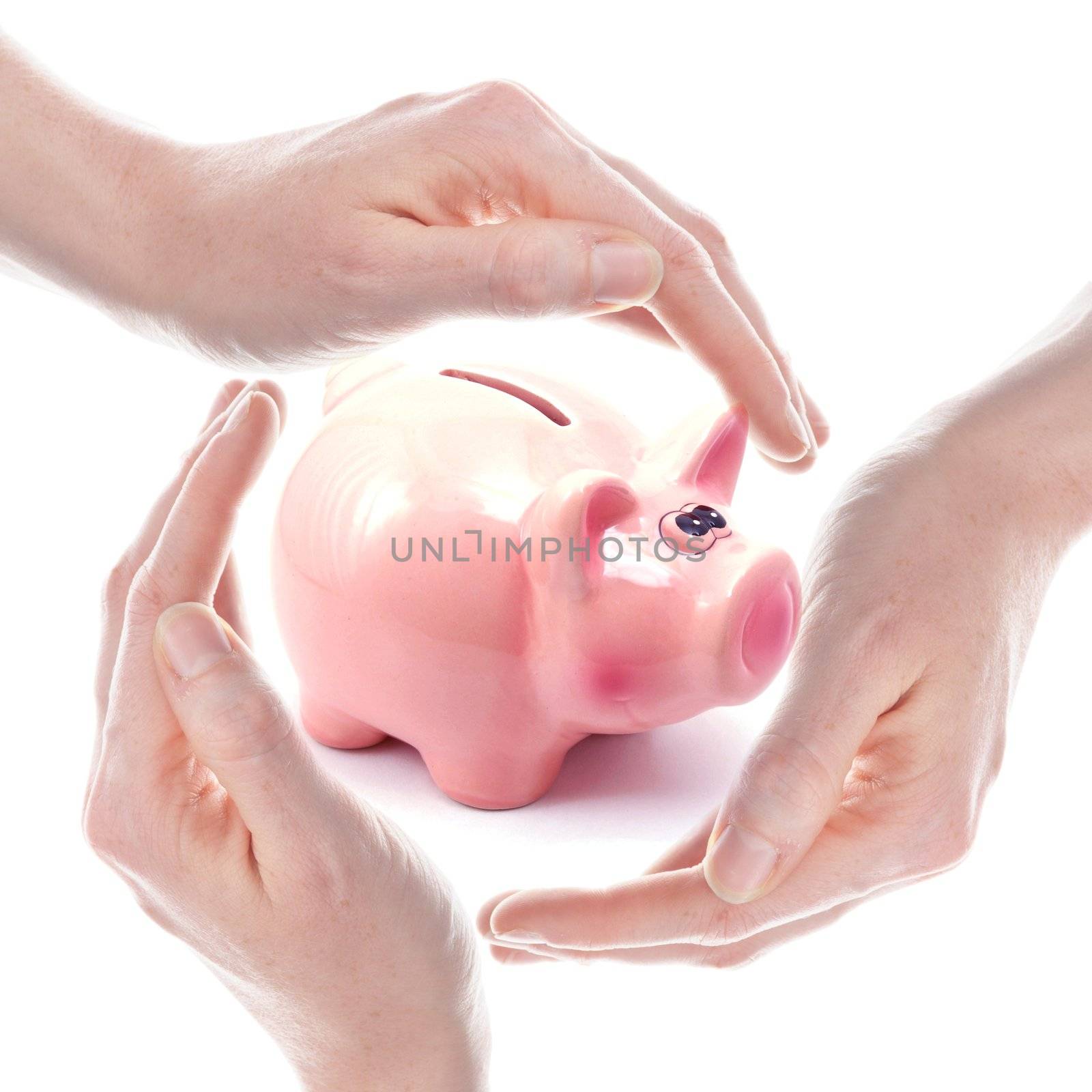 piggy bank and hand isolated on white background showing savings concept