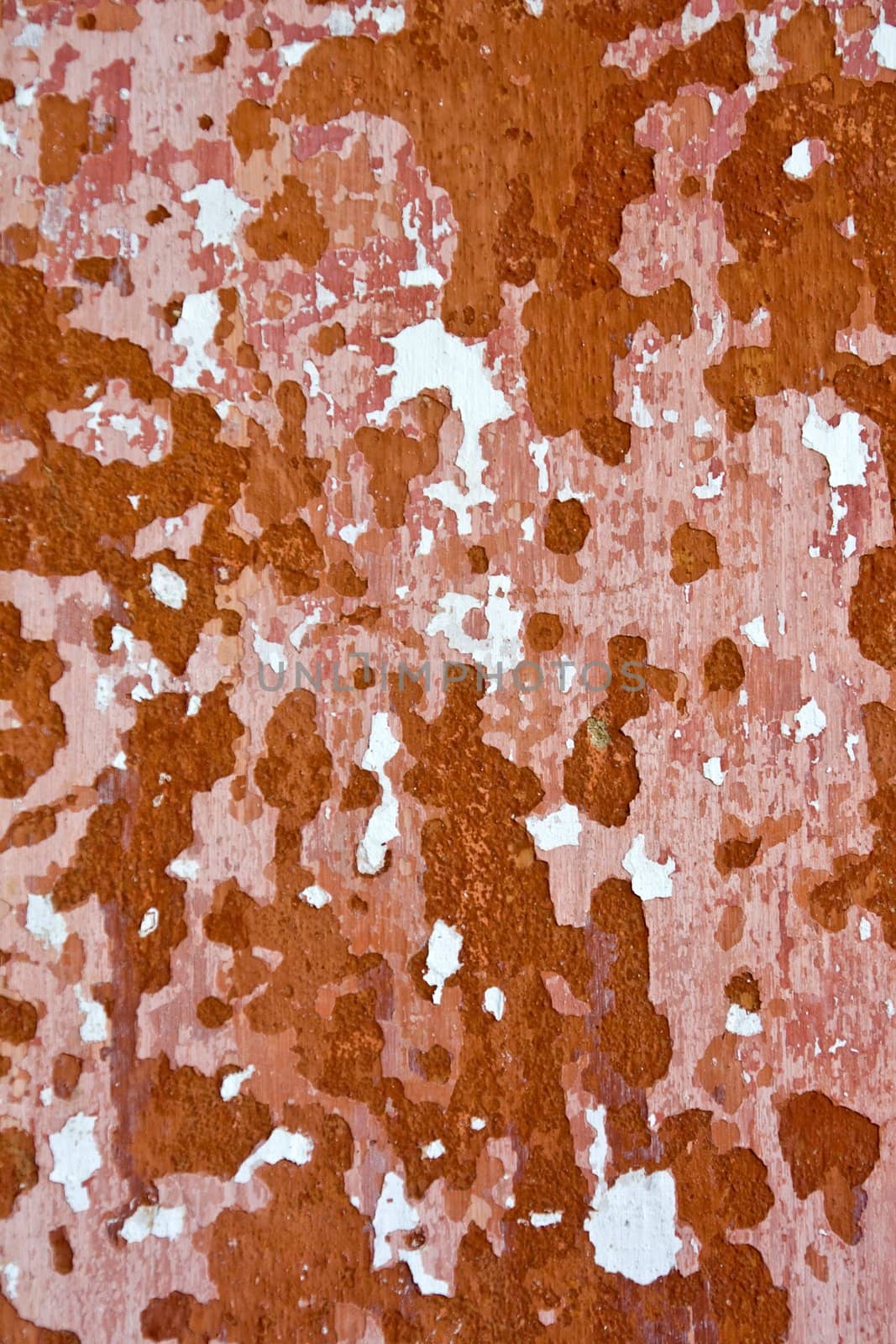 View of an old and peeled painted wall texture.