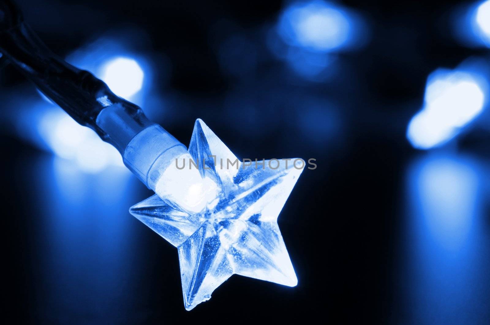 xmas or christmas holiday star lights with copyspace