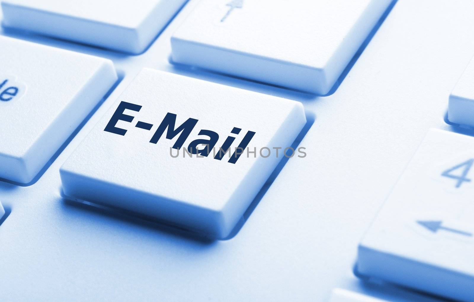 email e-mail or internet communication concept with key on keyboard