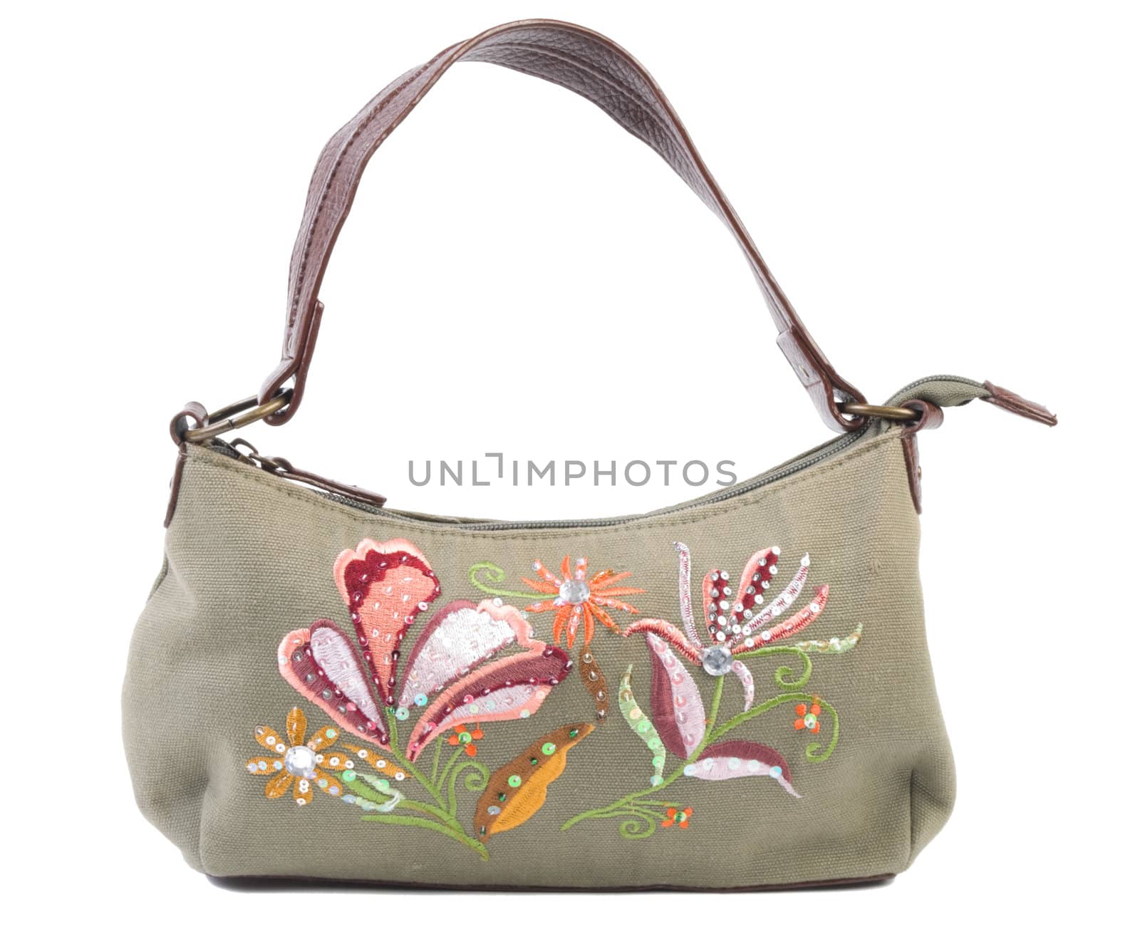Green textile female bag with floral ornaments. Isolated on white background