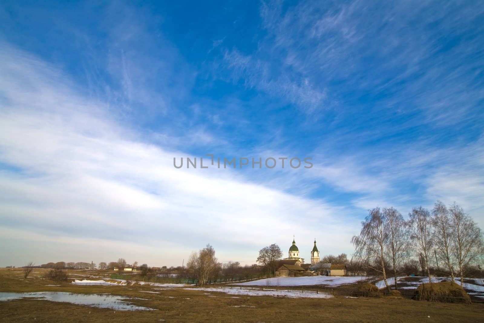 view series: rural early spring landscape with church