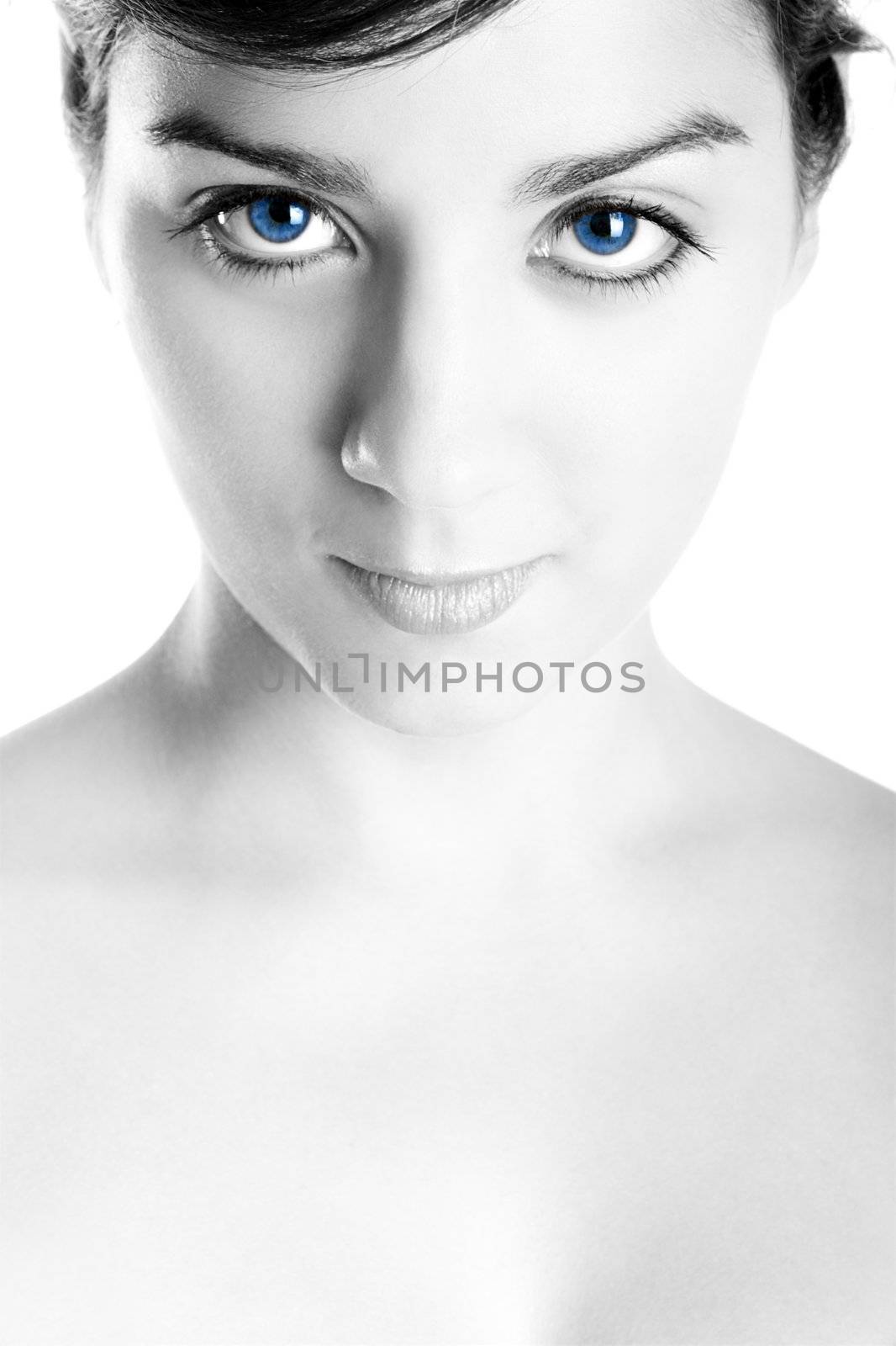 Portrait of a young and beautiful woman with blue eyes
