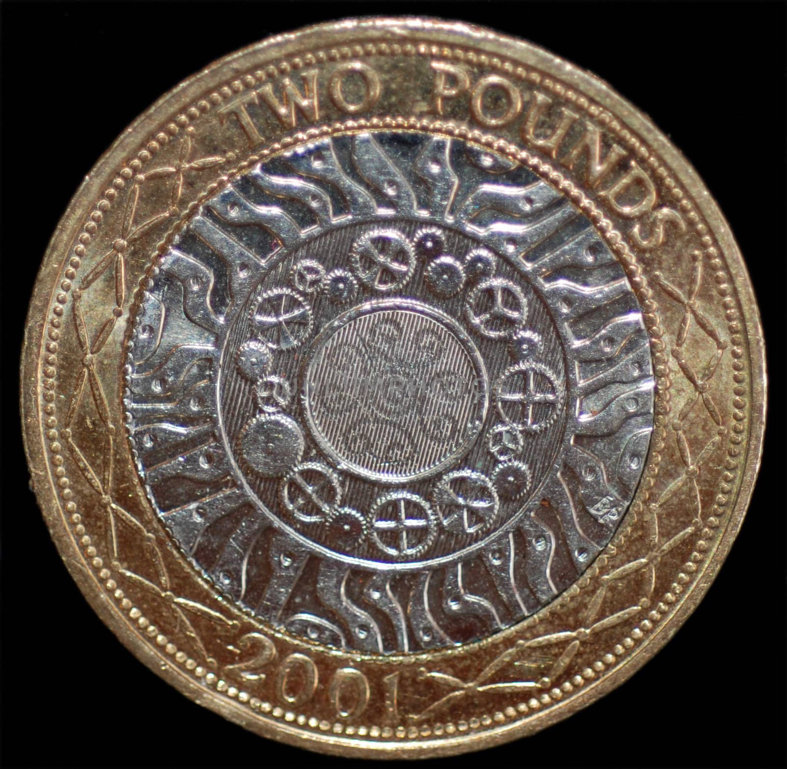 A close-up of a UK £2 coin.