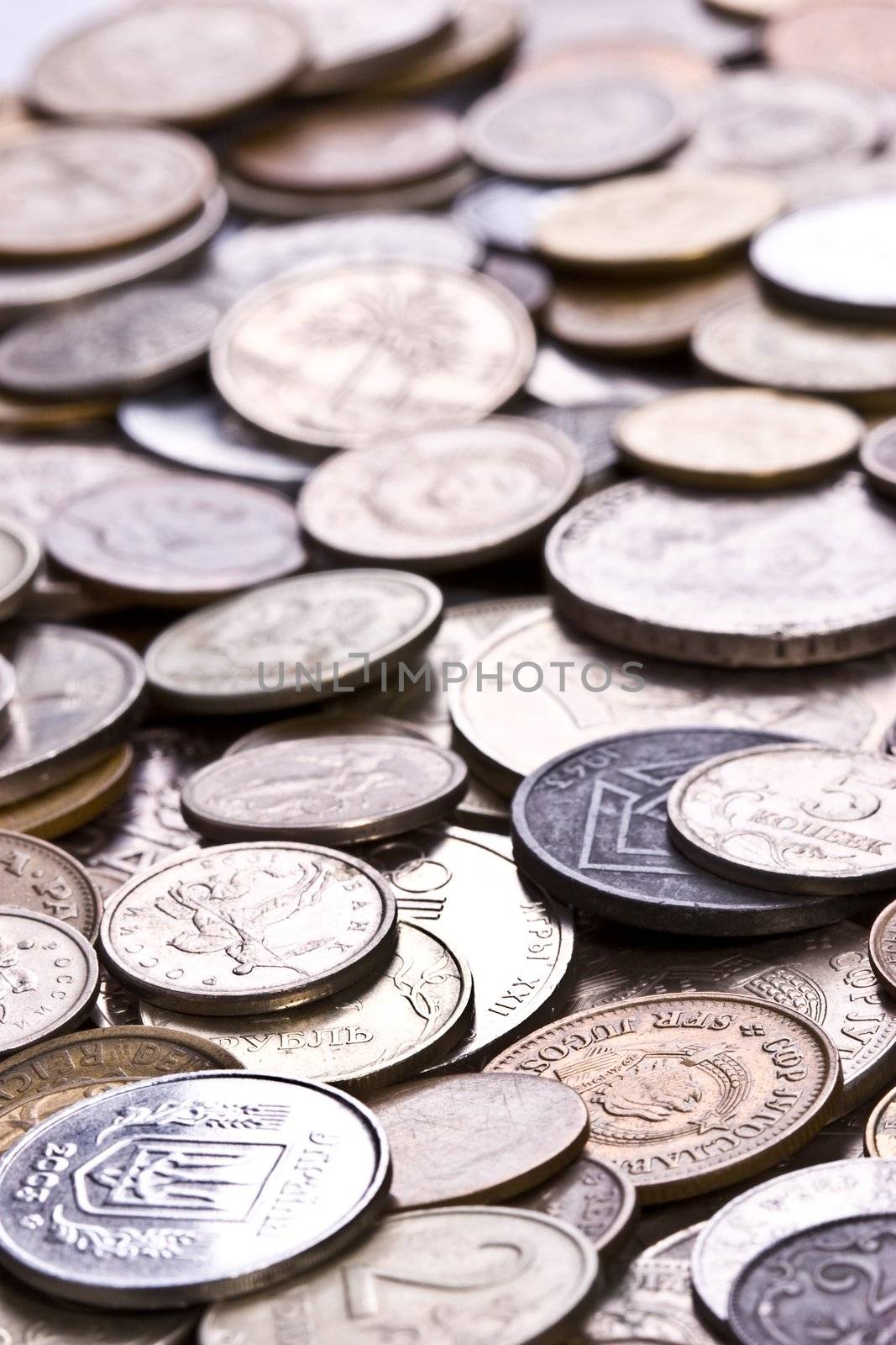 finance series: reflcetive multynational coins texture