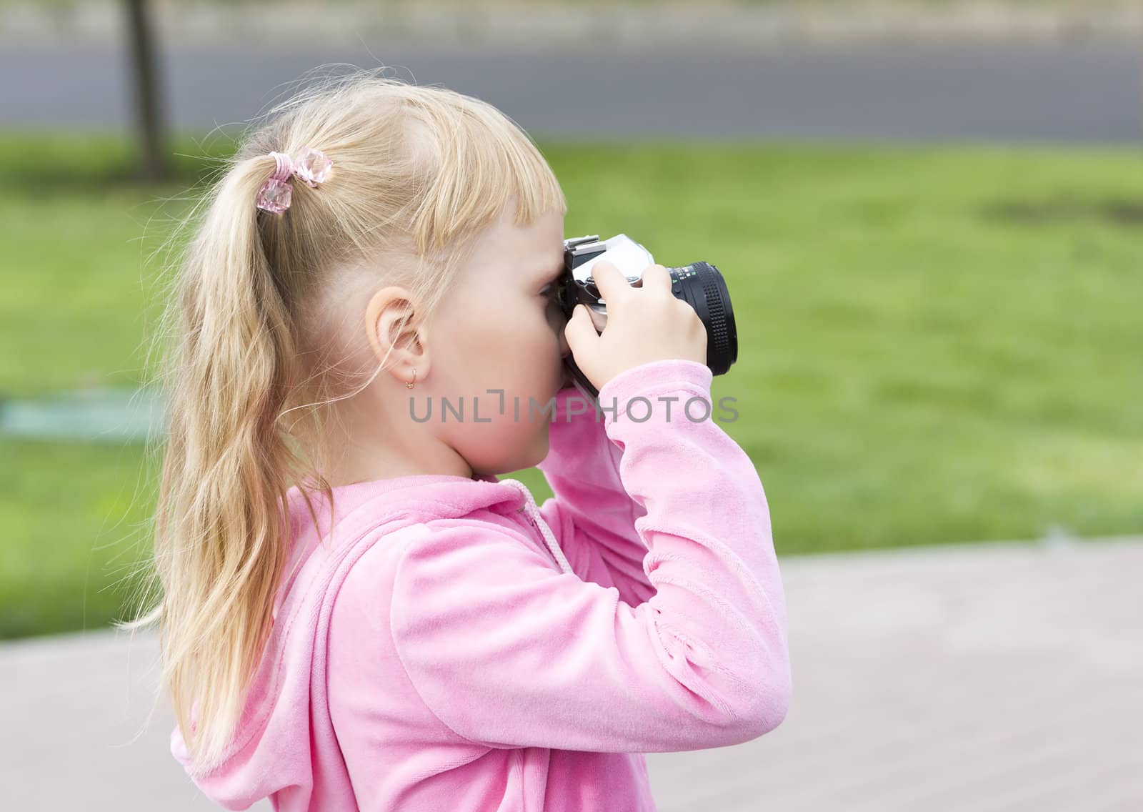 Little girl with the camera by Bedolaga