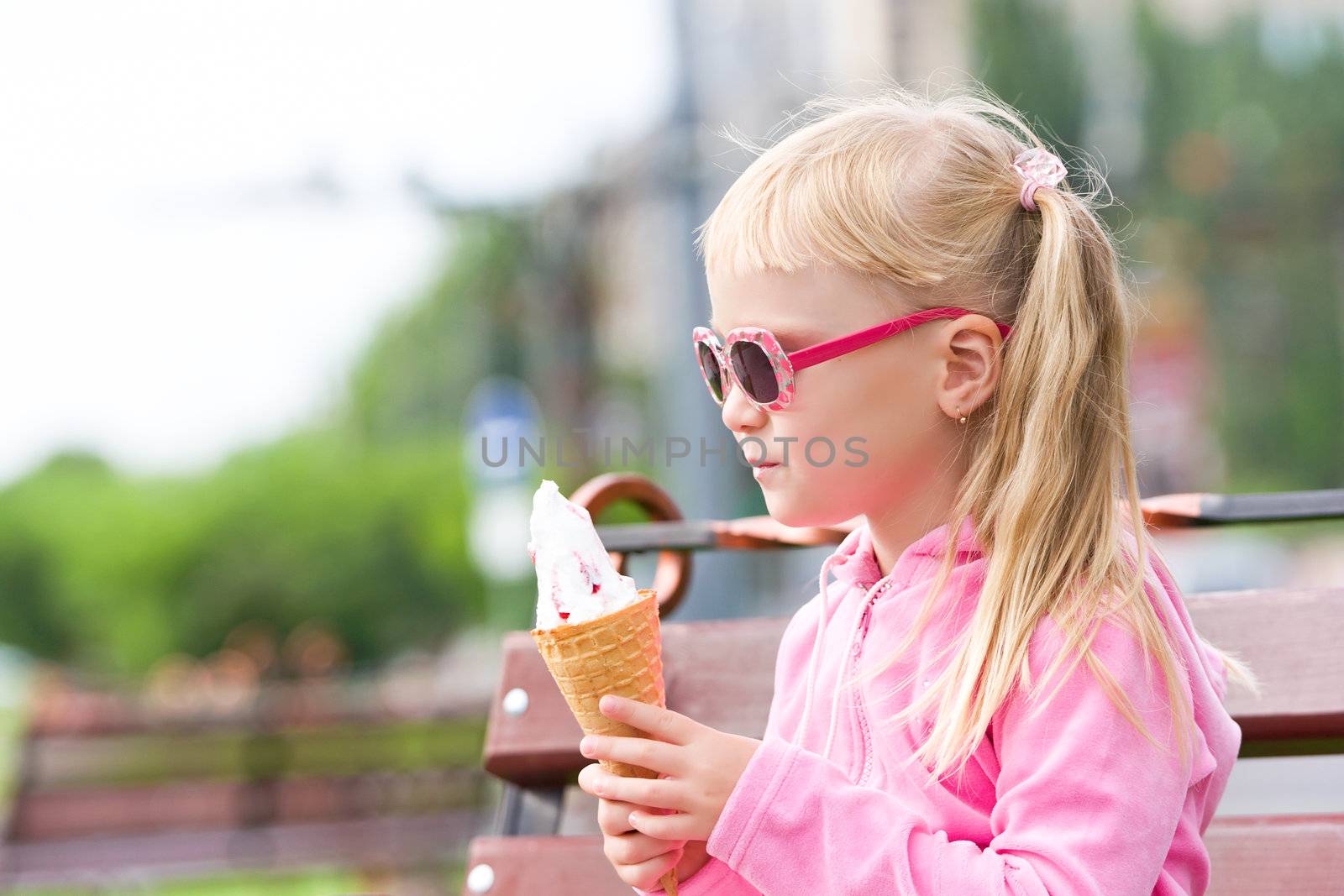 Little girl eating icecream Little girl eating icecream by Bedolaga