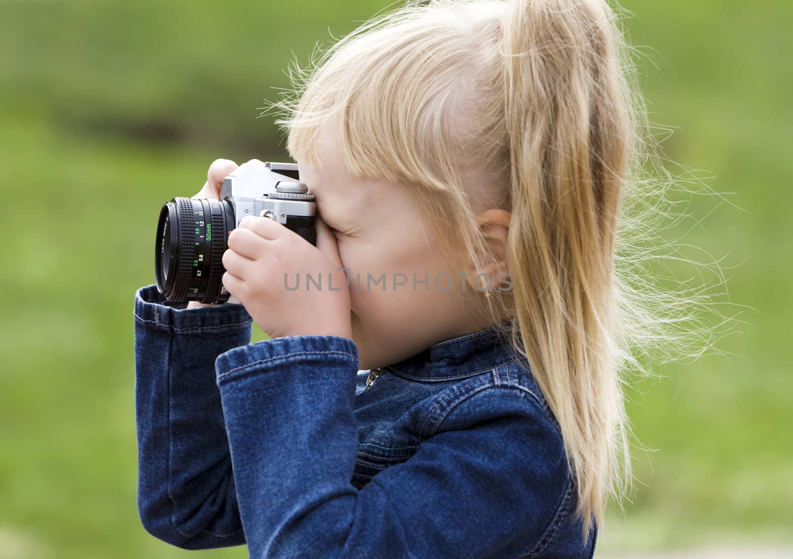 Little girl with the camera