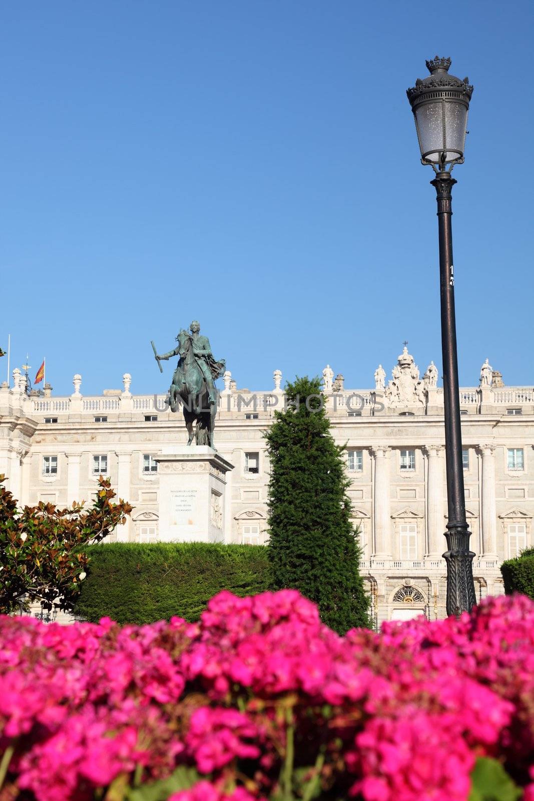 Madrid, Plaza de Oriente, Famous landmark in Madrid, Spain with the Royal Palace, Palacio de Oriente and statue of Felipe IV in the background. 