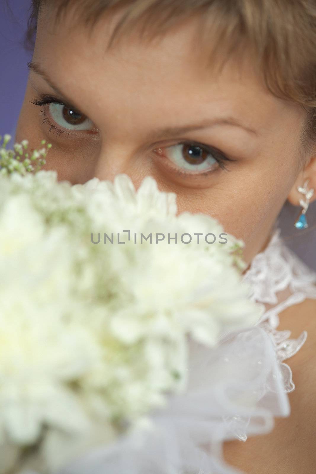 Bride with bouquet - eyes closeup by pzaxe