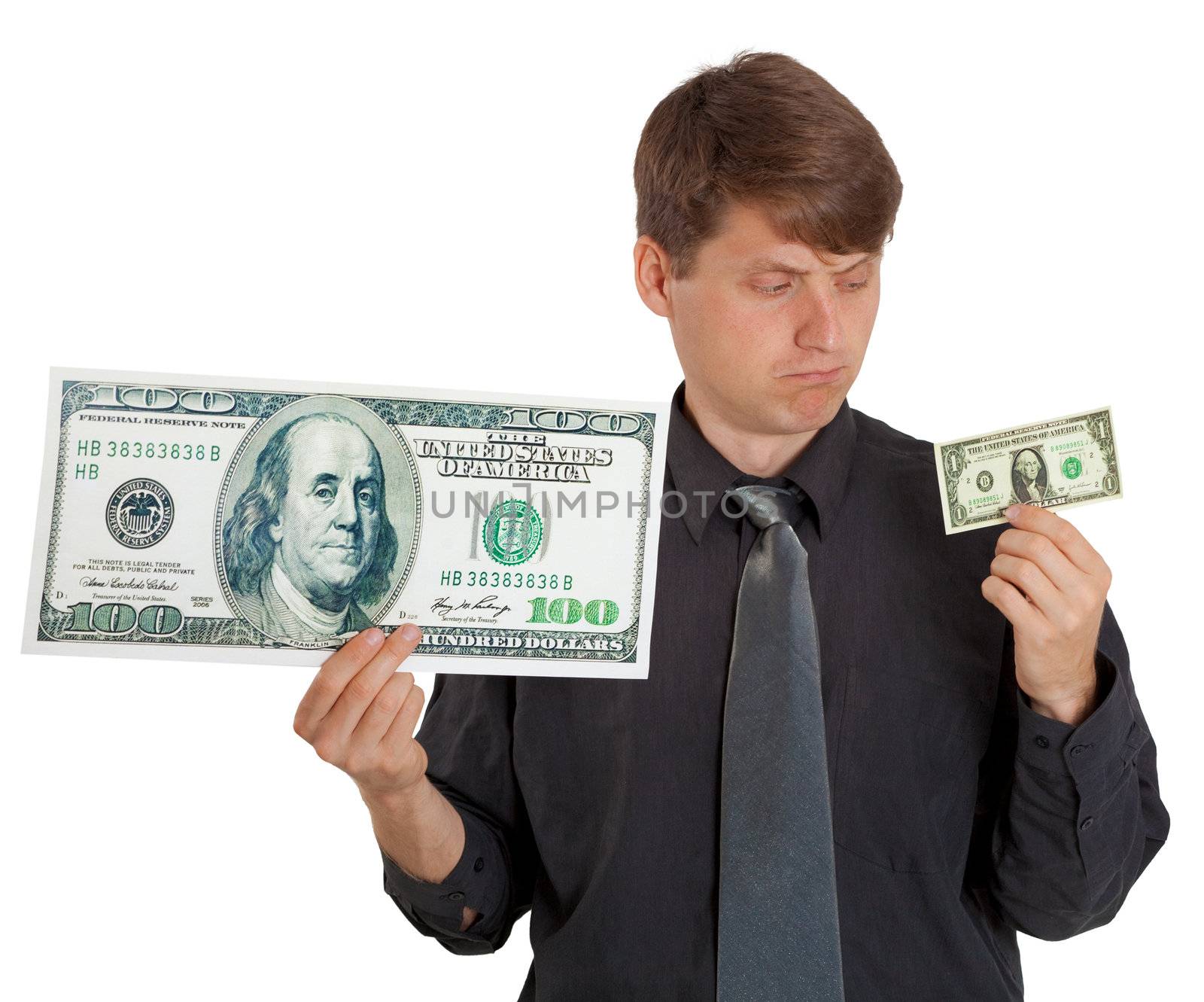 The businessman feels the difference between large and small money on white background