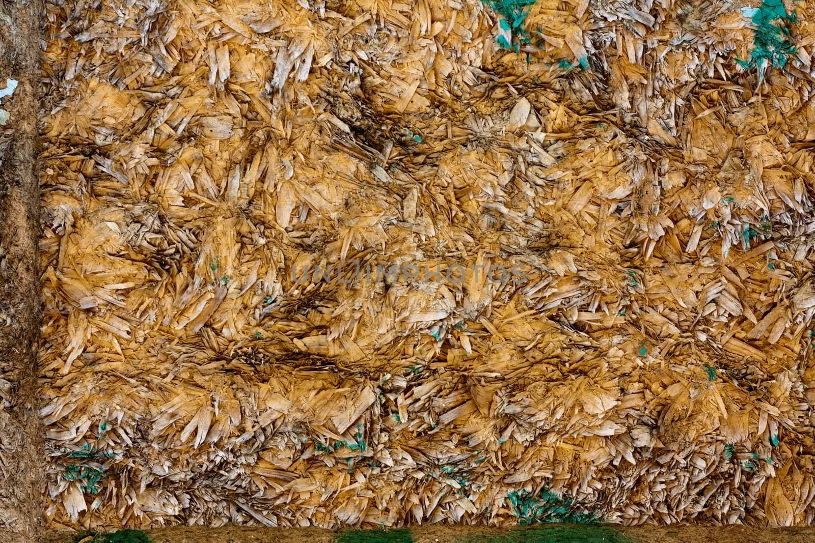 Close up view of a worn textured wooden wall.