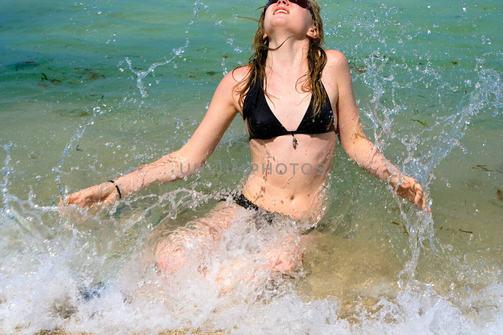 young woman on sea