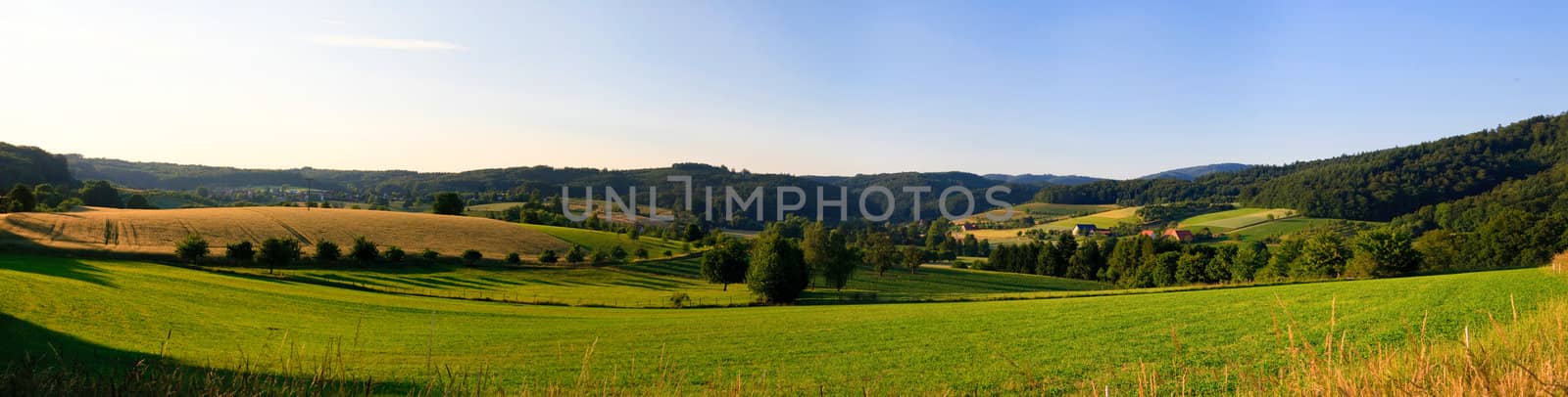 sumer landscape at Germany wiht blue sky and mountain by anobis
