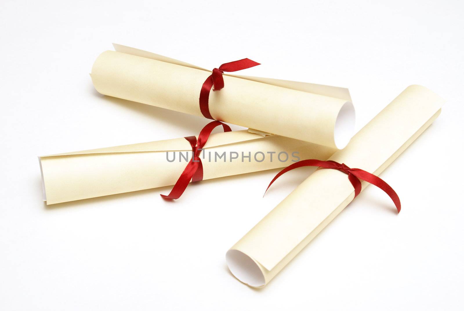 An isolated group of diplomas for graduating students.