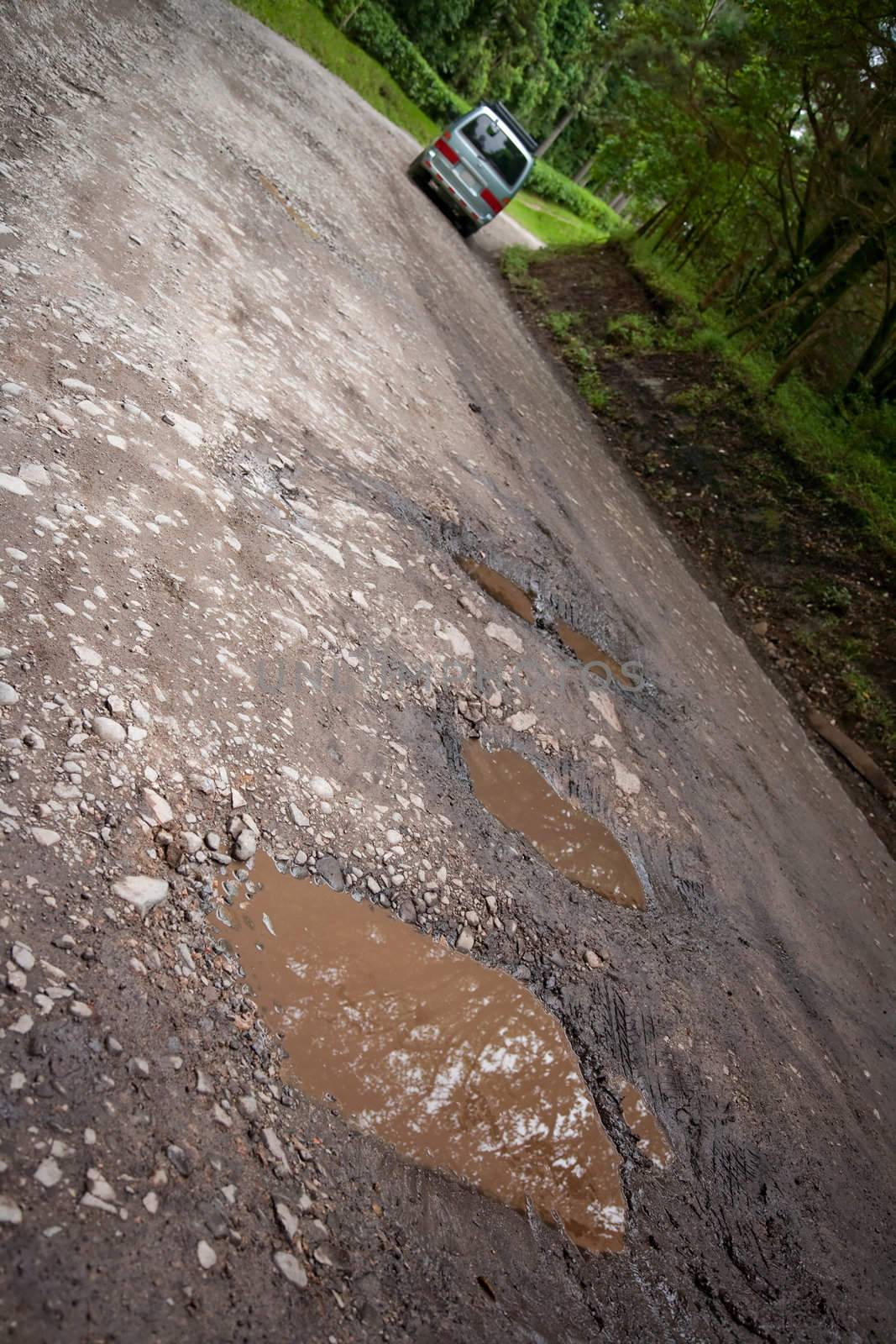 Famous Costa Rica potholes on rugged dirt road