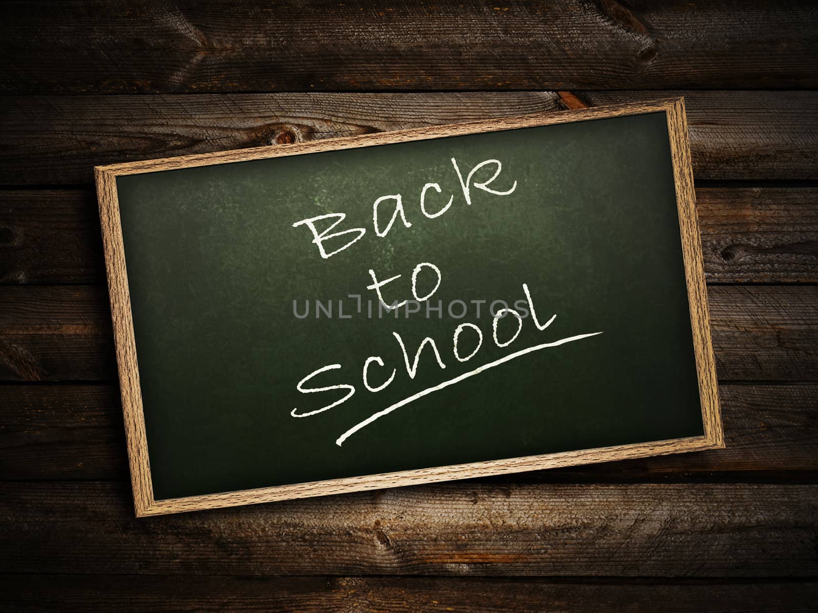 School blackboard at abstract dark wooden background  