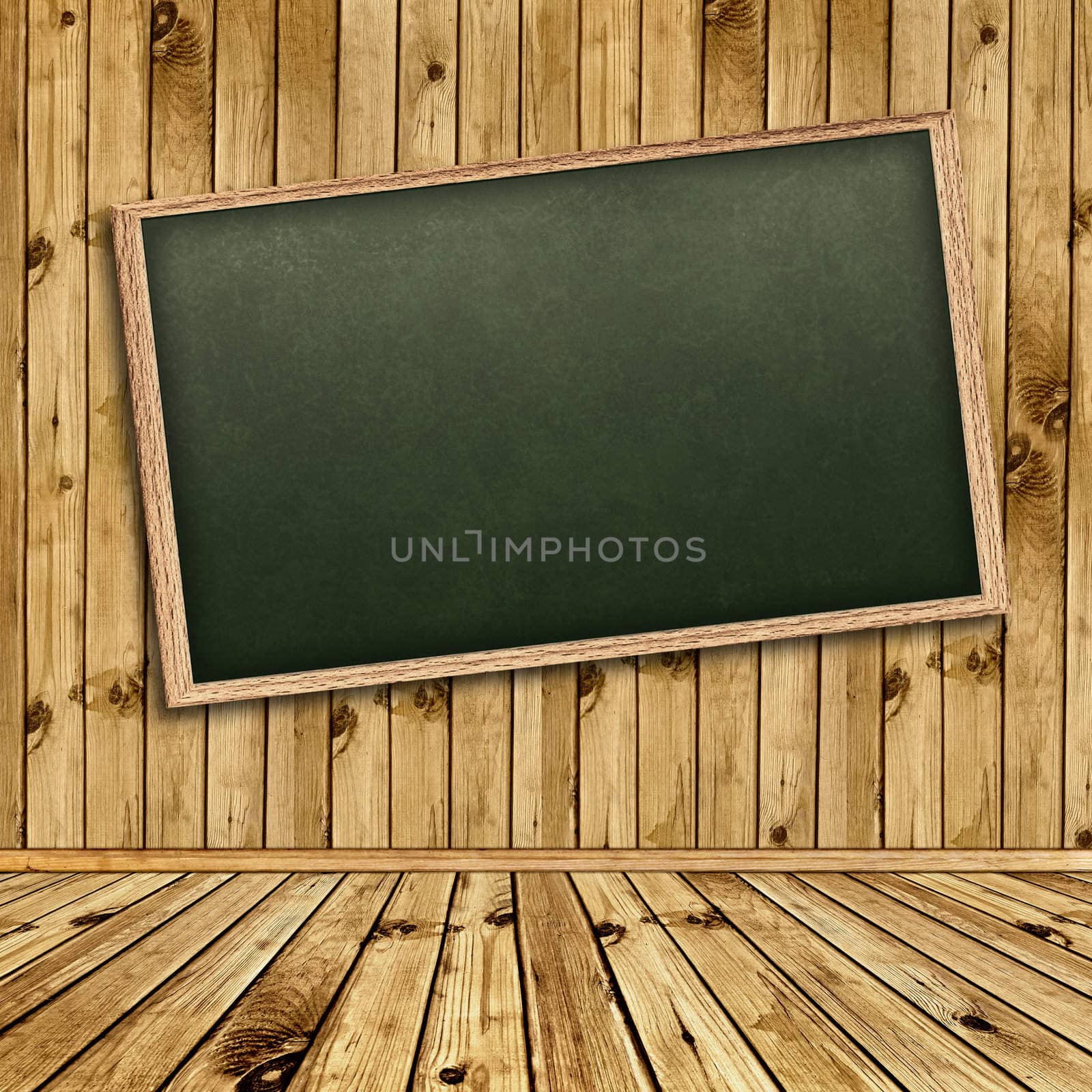 Empty school blackboard at wall in wooden interior 